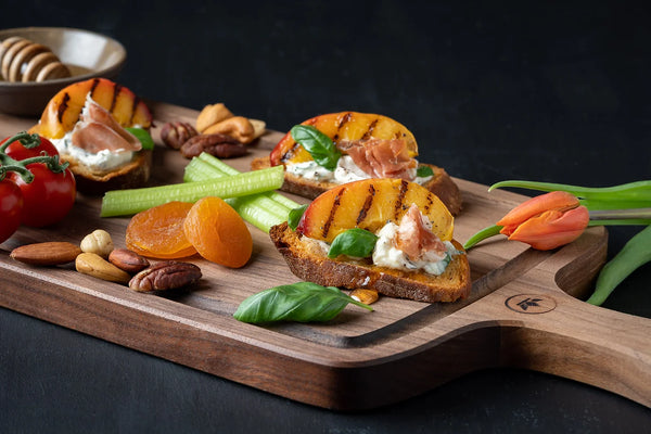 Crostini with grilled nectarines, ricotta cheese and parma ham